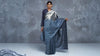 Blue kosa silk handloom saree with silver zari body and striped silver zaro pallu