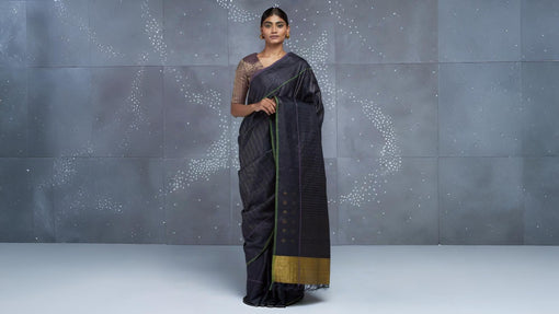 zari blouse with black saree