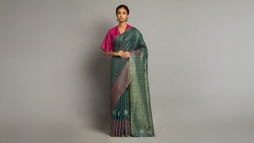 Bottle green kosa silk handloom saree with strip border and floral butis